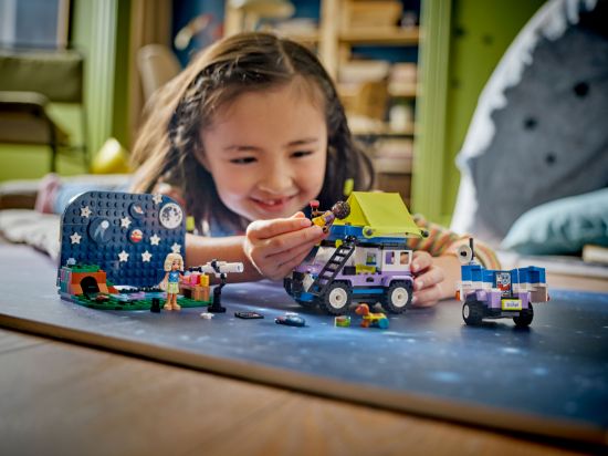 playing LEGO Friends 42603 Stargazing Camping Vehicle