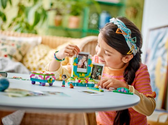 playing LEGO Disney Classic 43239 Mirabel's Photo Frame and Jewellery Box