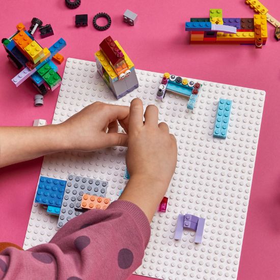 playing LEGO Classic 11026 White Baseplate