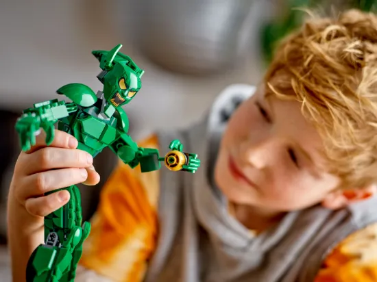 playing LEGO Super Heroes 76284 Green Goblin Construction Figure