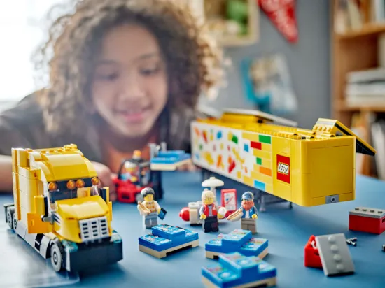 playing LEGO City 60440 Yellow Delivery Truck