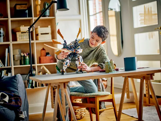 playing LEGO Ninjago 71821 Cole's Titan Dragon Mech