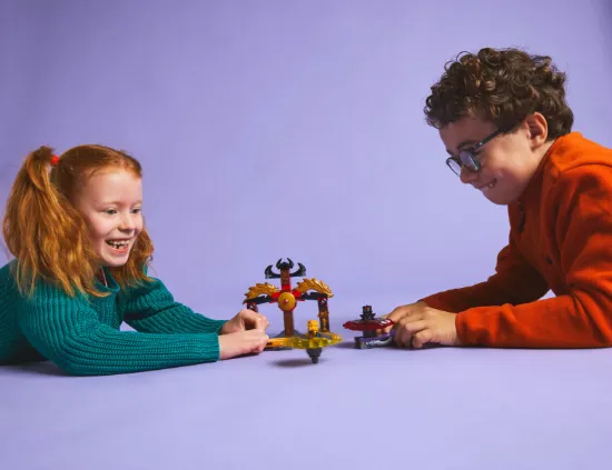 playing LEGO NINJAGO 71826 Dragon Spinjitzu Battle Pack