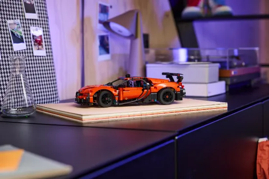 playing LEGO Technic 42222 Bugatti Chiron Pur Sport Hypercar Vehicle