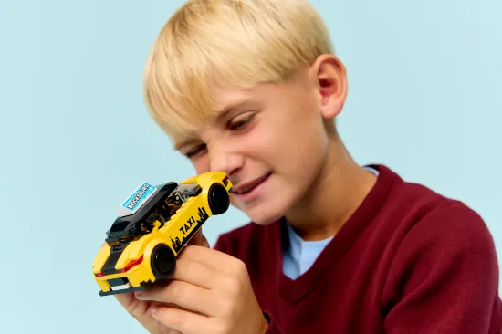 playing LEGO City 60487 Yellow Taxi Vehicle
