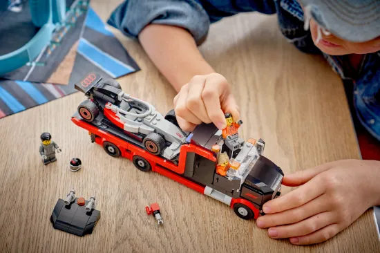 playing LEGO City F1 60493 Display Truck with Audi F1® Race Car