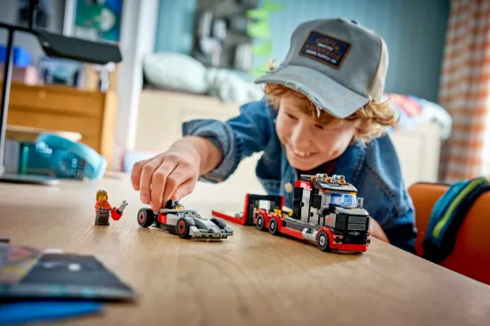 playing LEGO City F1 60493 Display Truck with Audi F1® Race Car