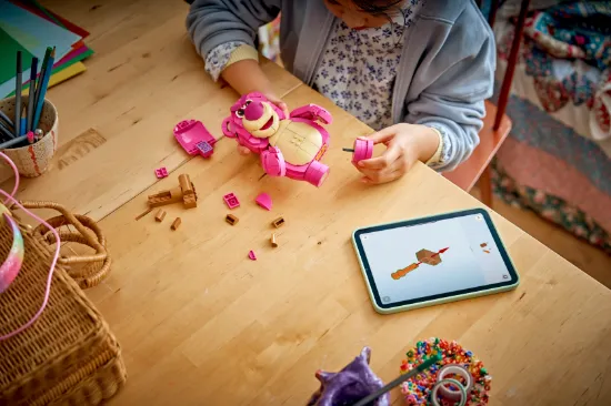 playing LEGO Disney and Pixar 43306 Toy Story Lotso