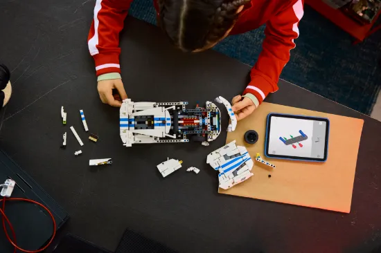playing LEGO Technic 42234 Dodge Viper GTS-R Sports Car