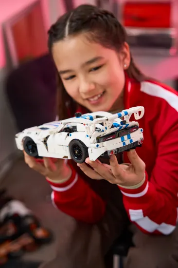 playing LEGO Technic 42234 Dodge Viper GTS-R Sports Car