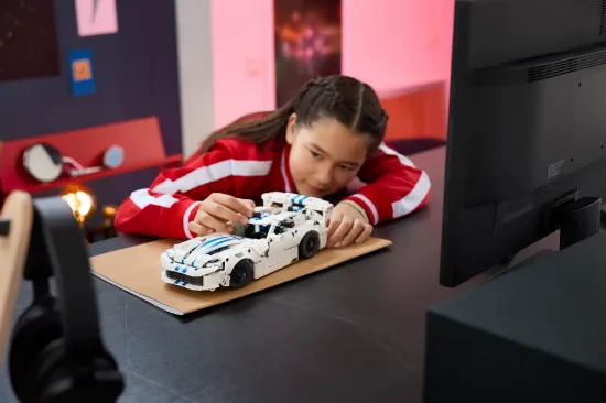 playing LEGO Technic 42234 Dodge Viper GTS-R Sports Car