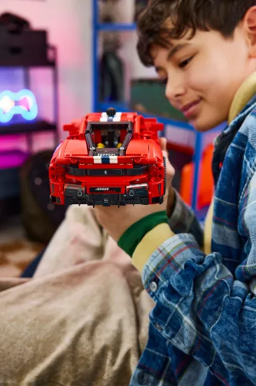 playing LEGO Technic 42235 Ferrari 488 Pista Car