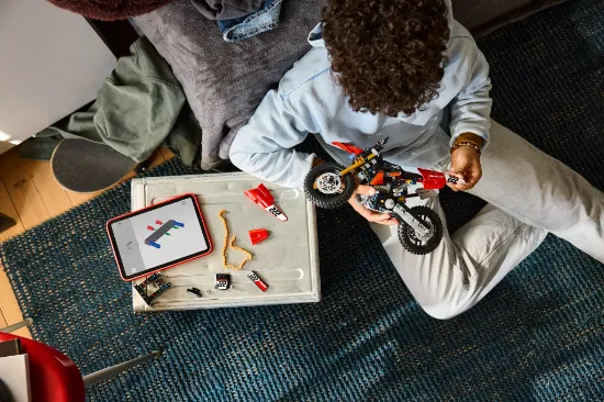 playing LEGO Technic 42238 Ducati Desmo450 MX Factory Motorcycle